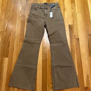 Tan mid-rise flare jeans